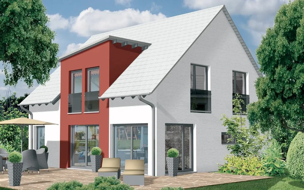 Ein modernes zweistöckiges Haus mit Terrasse.