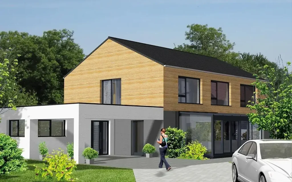 Modernes Haus mit Garten und einer Person auf dem Gehweg.