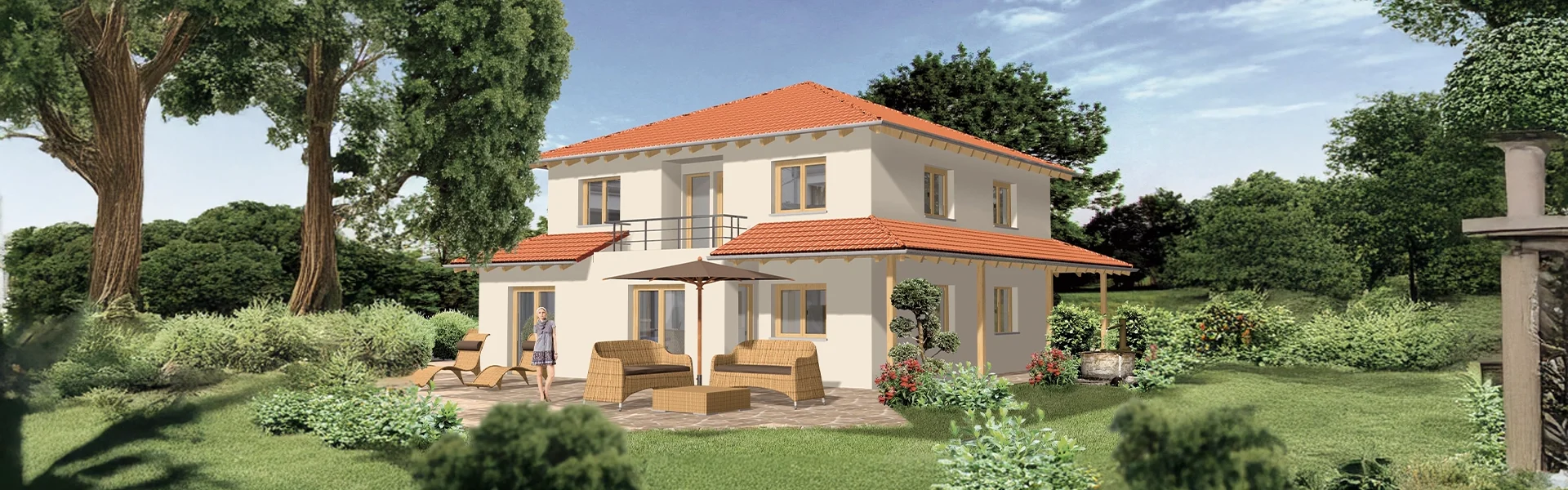 Zweistöckiges Haus mit Gartenmöbeln auf der Terrasse.